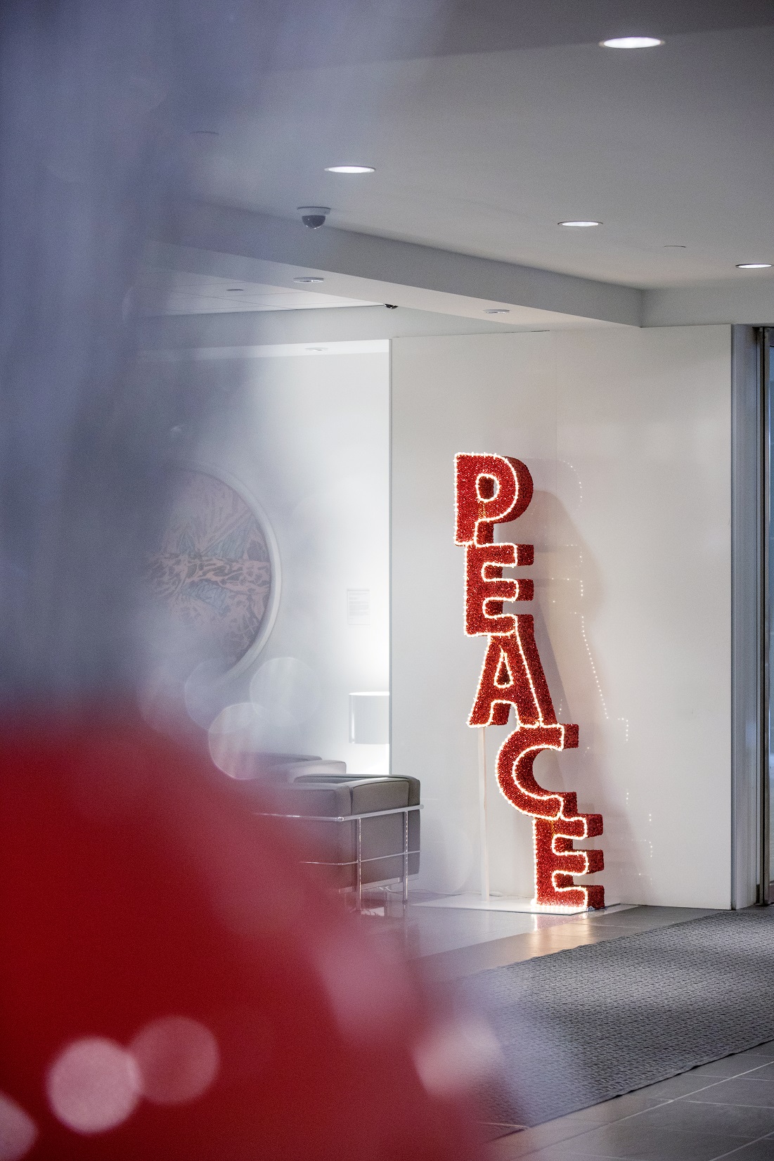 Creative sculptures and 3D letters come together to light up this contemporary lobby through the holiday season