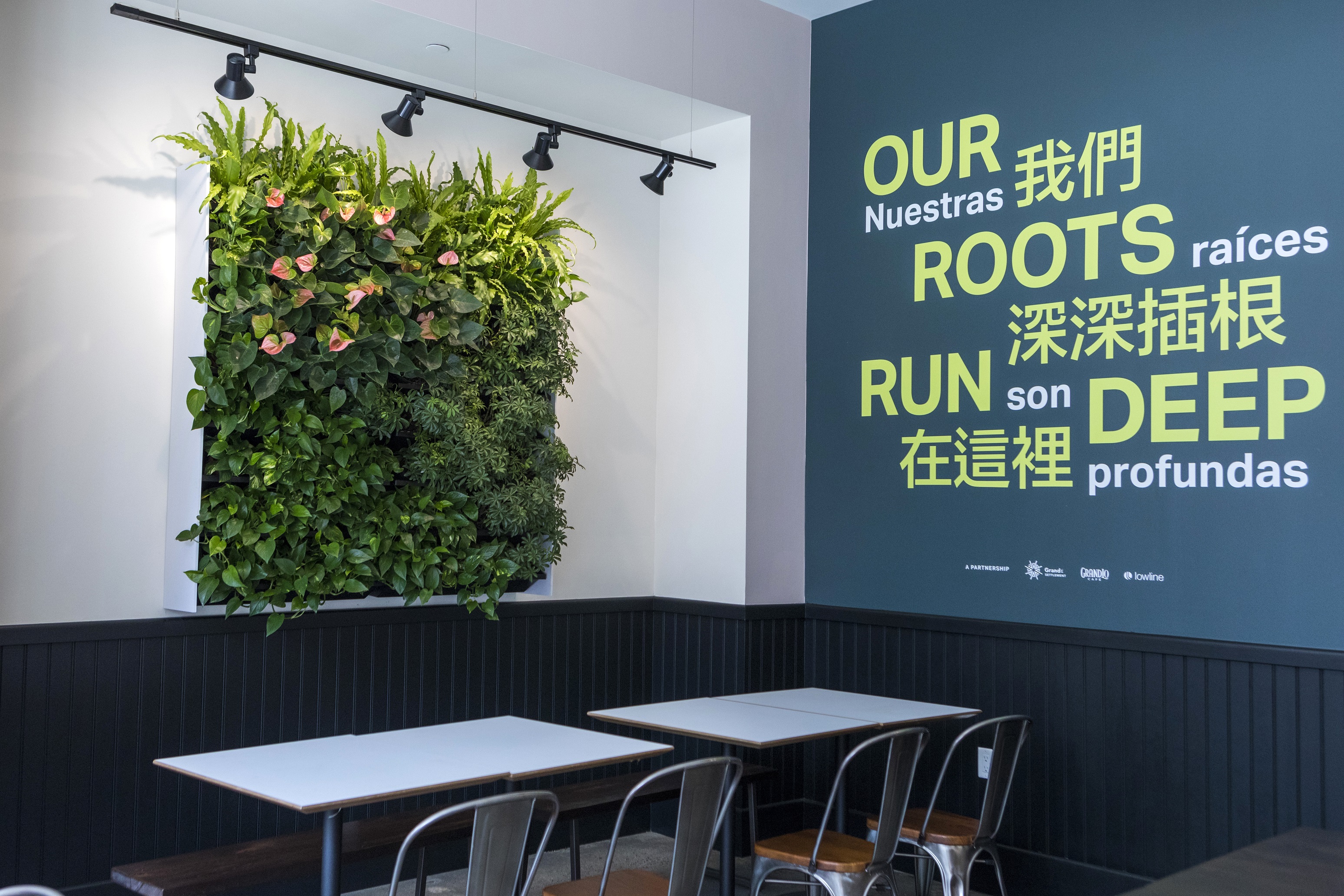 The introduction of crisp green plants into this café create a great conversation piece as customers catch up with friends.