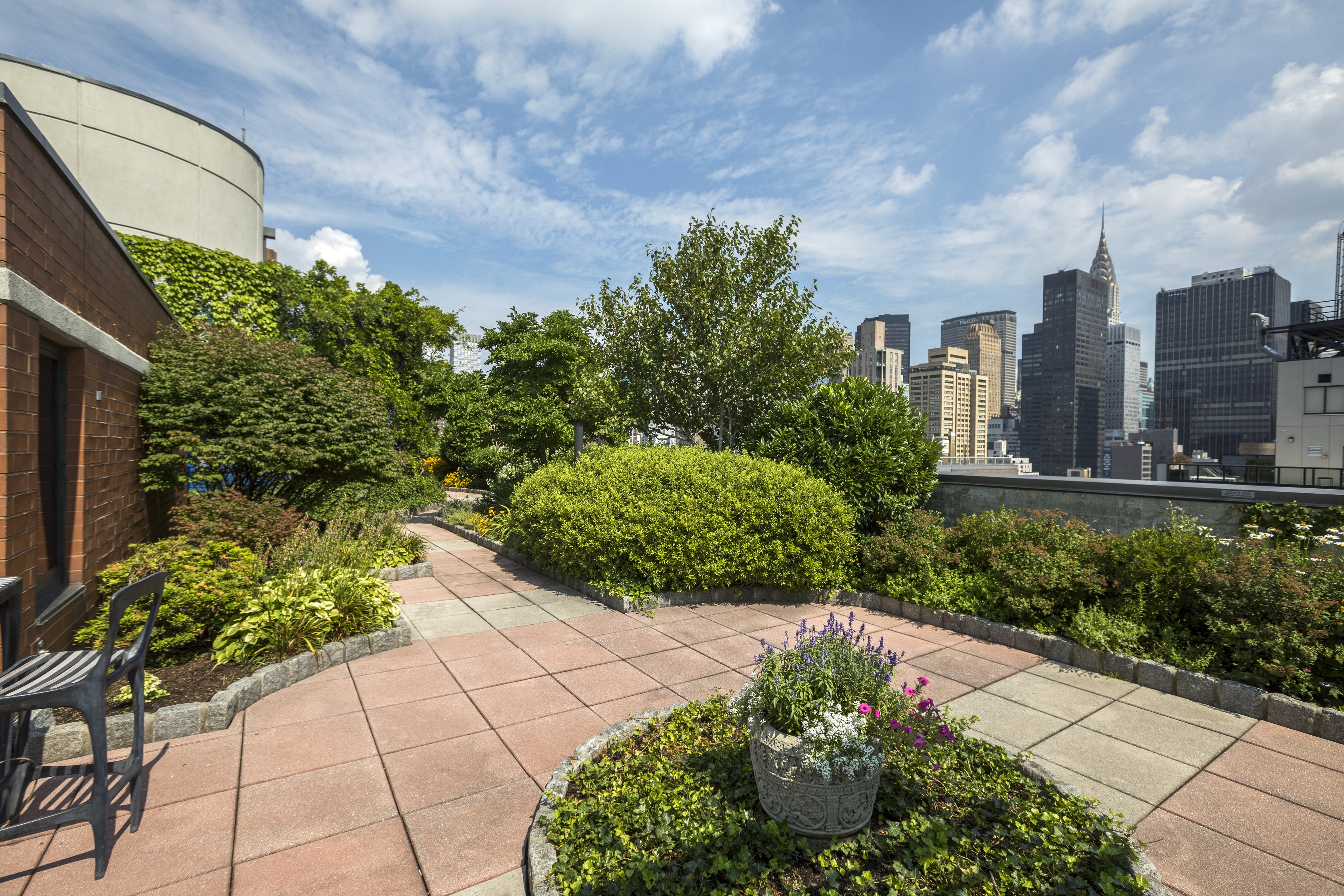 Get a bird’s eye view as you wind your way through the path of this endless rooftop garden sanctuary.