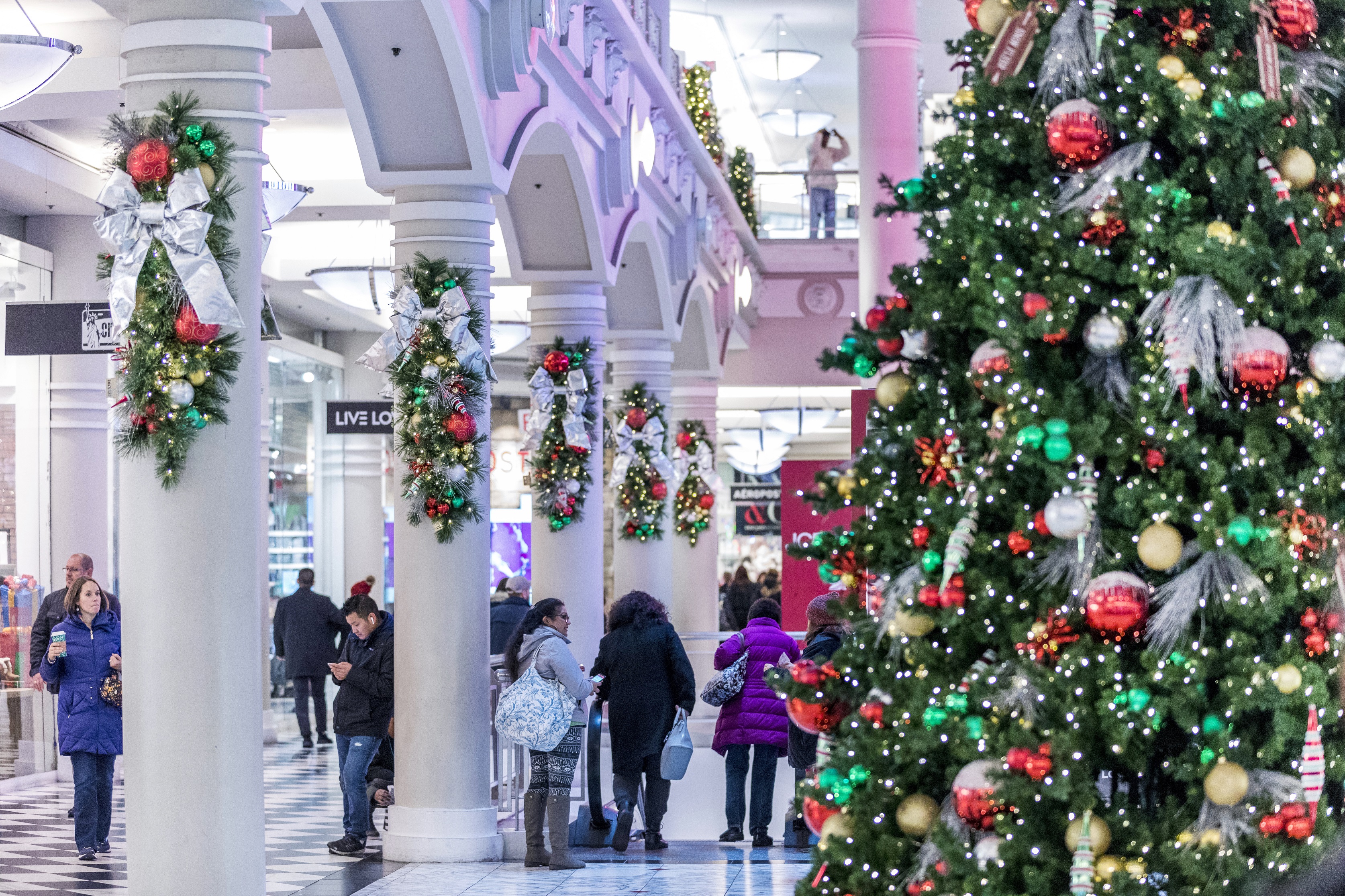Holiday cheer resonates through the great hall of this shopping center sparking joy and excitement for visitors big and small.