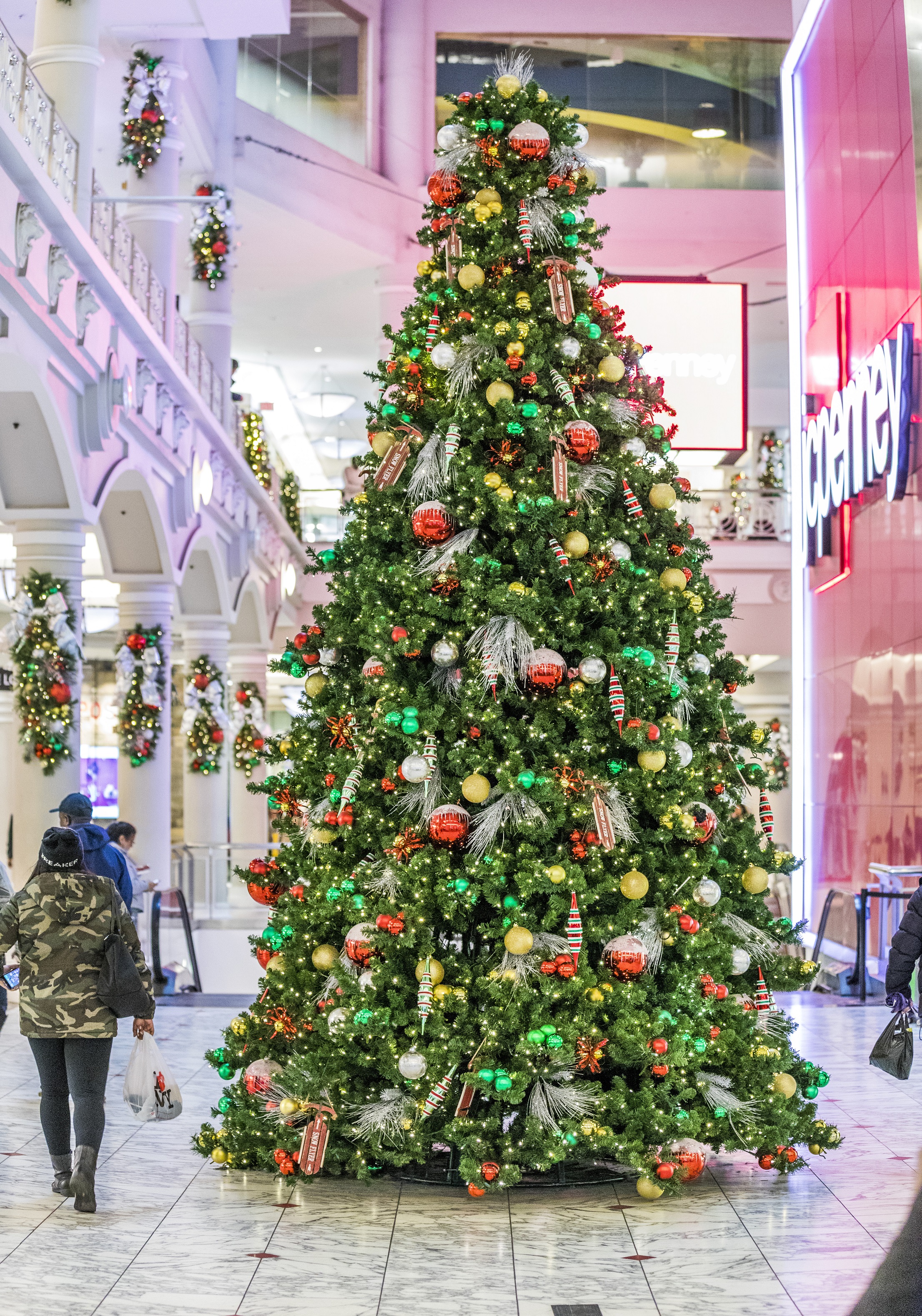 Holiday cheer resonates through the great hall of this shopping center sparking joy and excitement for visitors big and small.