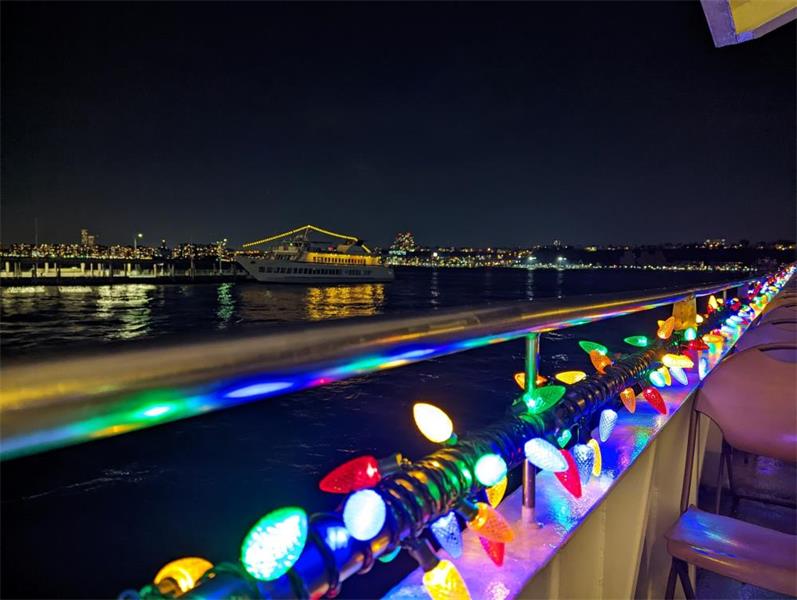 Holiday lights on a boat rail